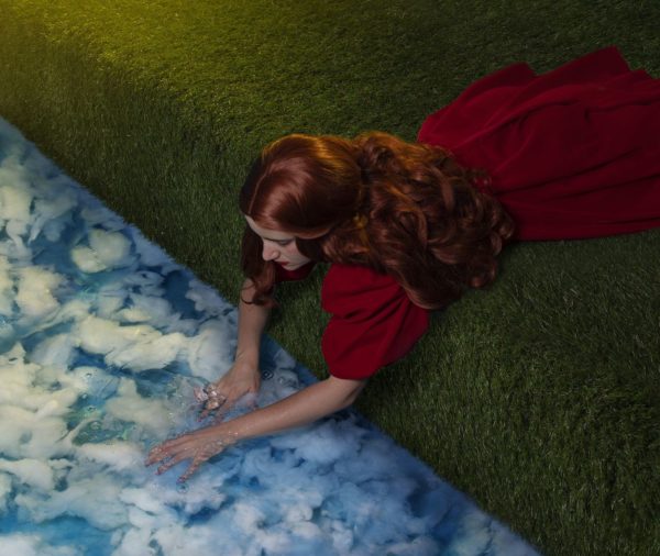 girl touching water